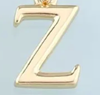 Gold greek letter charm