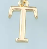 Gold greek letter charm