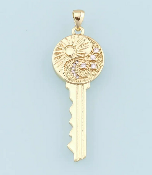 Sun and moon key charm