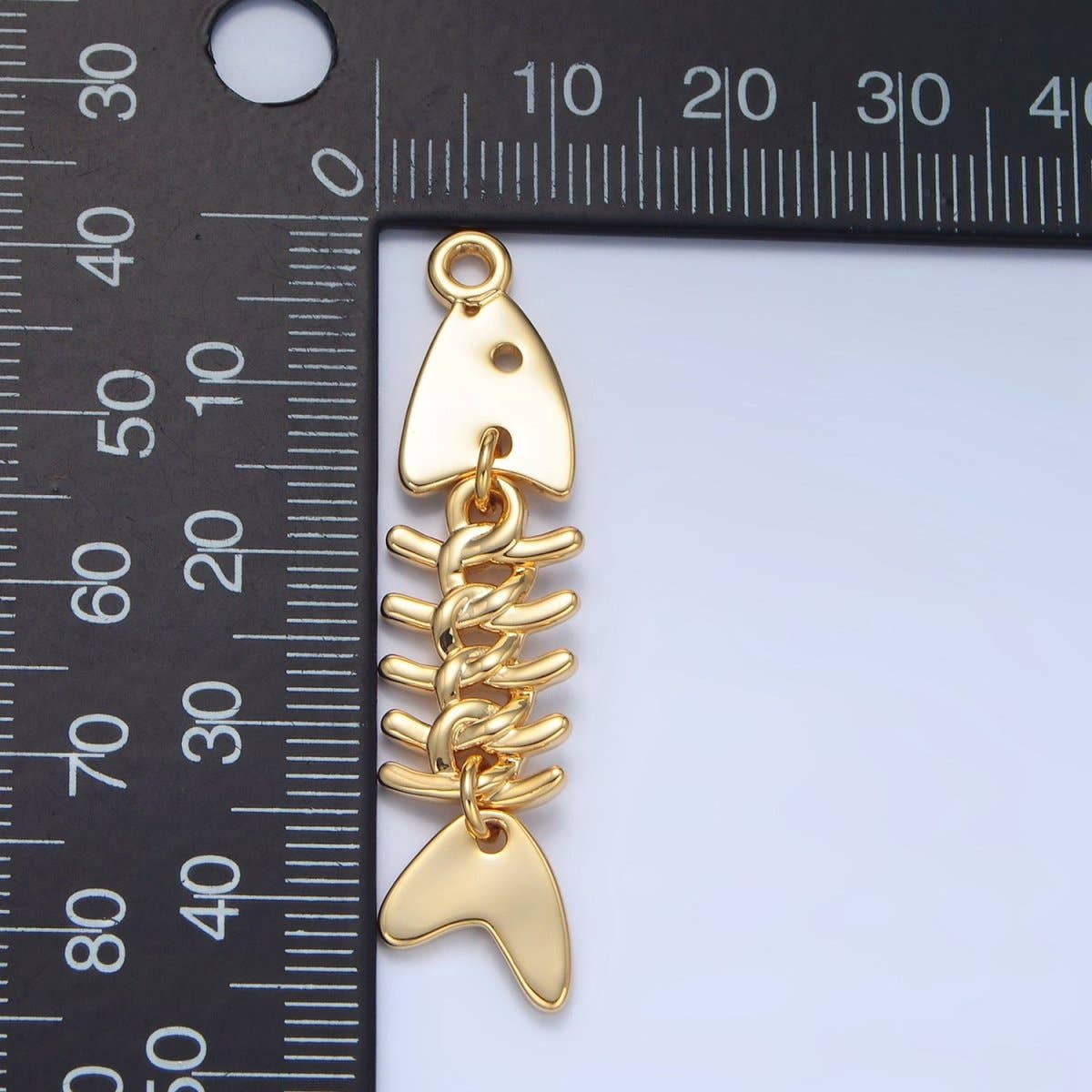Gold Skeleton Fish Charm